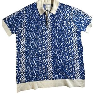 New American Eagle knit sweater polo in a fun blue and cream print. Size Medium.